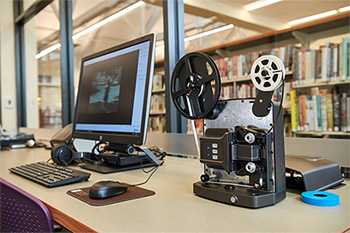 CCPL's new Jack, Joseph and Morton Mandel Memory Lab allows residents to digitize film and photography while working on family histories.