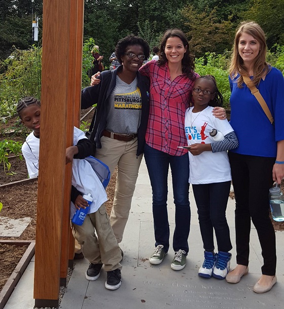 two students, the physical education teacher at Urban Pathways, Let’s Move! Director, in the White House garden with Let’s Move Pittsburgh Program Director.