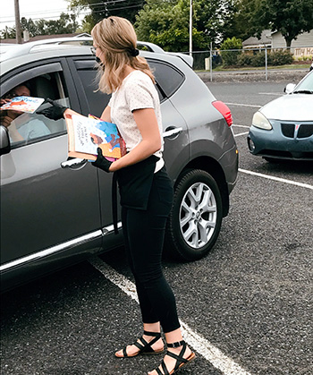 Lewiston City Library, car delivery of materials