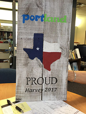 Commemorative wood made from one of the fences blown down by Hurricane Harvey.