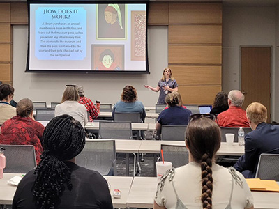 presenter speaking to adults in a continuing education class