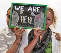 Two students pose for the photobooth