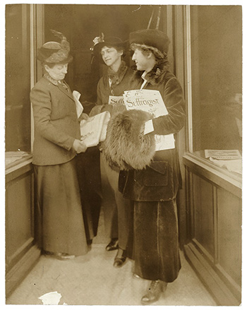 Rep. Jeanette Rankin of Montana, left, reading The Suffragist, Washington, ca. 1917-1918. c. 1917-1918. Library of Congress, Washington, D.C.