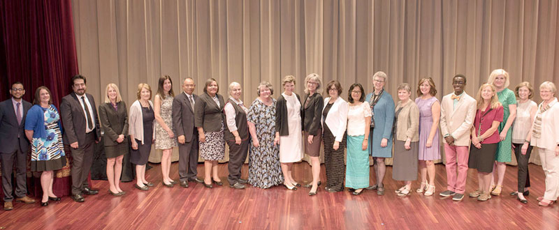 National Medal Winners on stage with IMLS director.