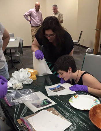 Two women at workshop table