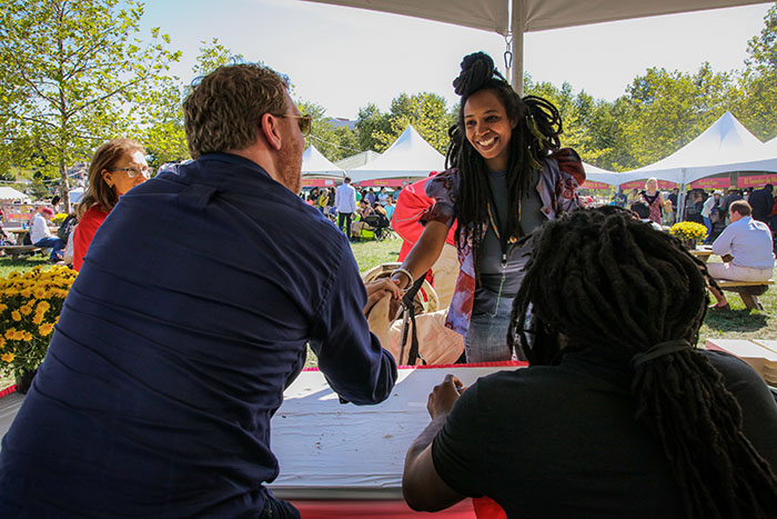 Students receive copies of book signed by authors