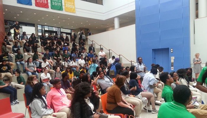 Maryland high school students listen to authors in lecture hall