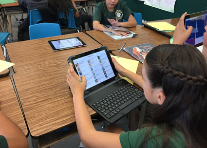 A student at Magee Academy in Pico Rivera, CA, selects a book with the Open eBooks app. According to Principal Gisela Castañon, the Open eBooks app provides her students access to desperately needed quality titles that are available for hours of reading pleasure and practice. Photo courtesy of Magee Academy.