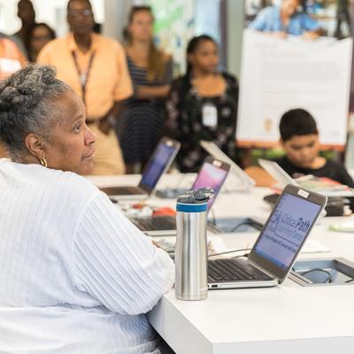 Library Patrons attend a Critical Path Center open house to learn about the digital literacy training courses available at Philadelphia FIGHT Community Health Centers. (Photo courtesy of Philadelphia FIGHT)