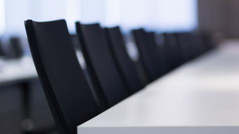 Chairs and Table in a Meeting Room