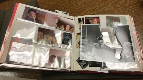 Red photo album with images