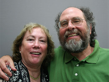 A man and woman standing together.